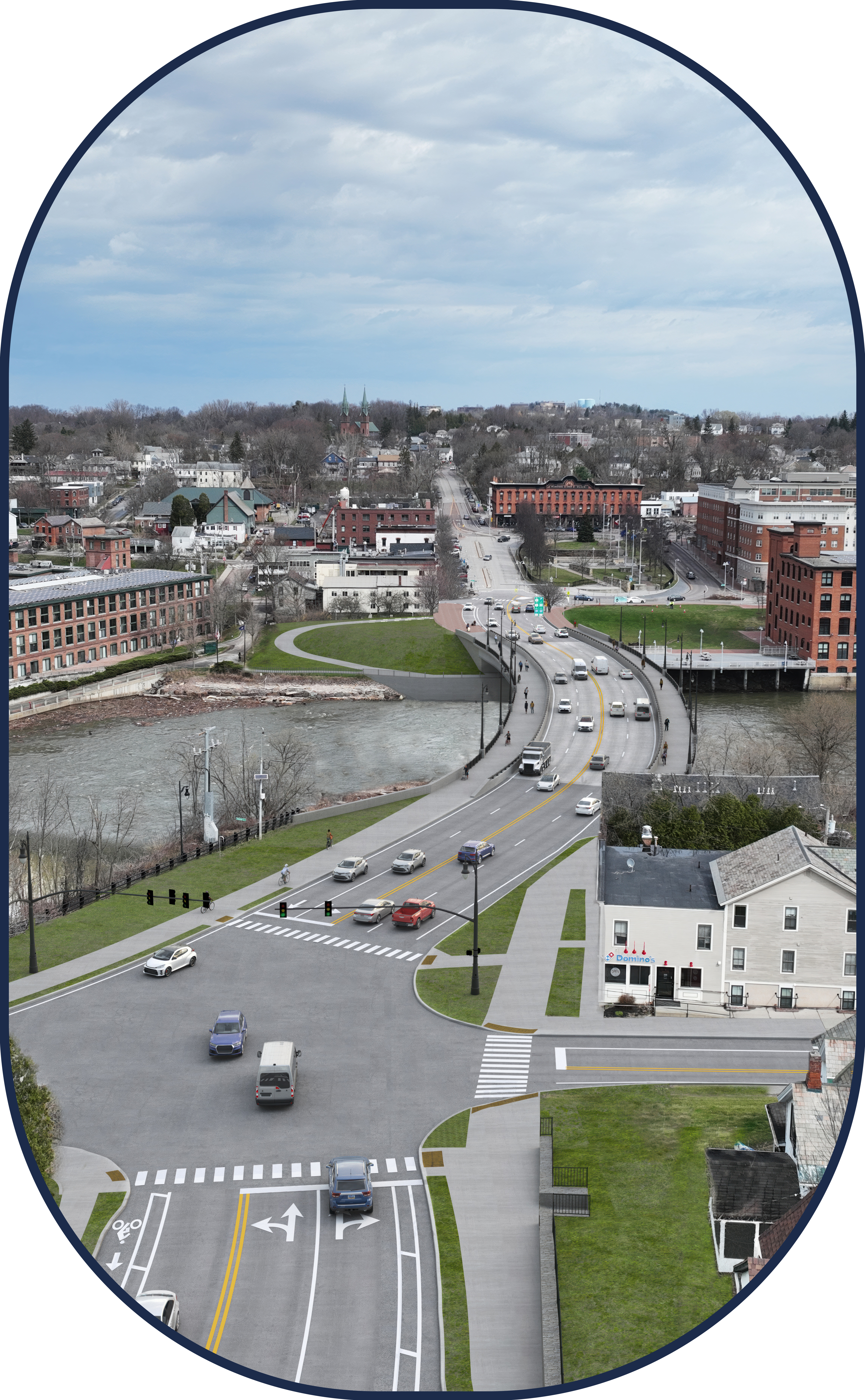 An aerial view of a newly constructed bridge spanning a river, connecting two parts of a city. Commercial buildings and parking lots line one side, while residential houses with green yards and trees are on the other. The river has greenish water, and nearby, there’s an intersection with traffic lights and pedestrian crossings.